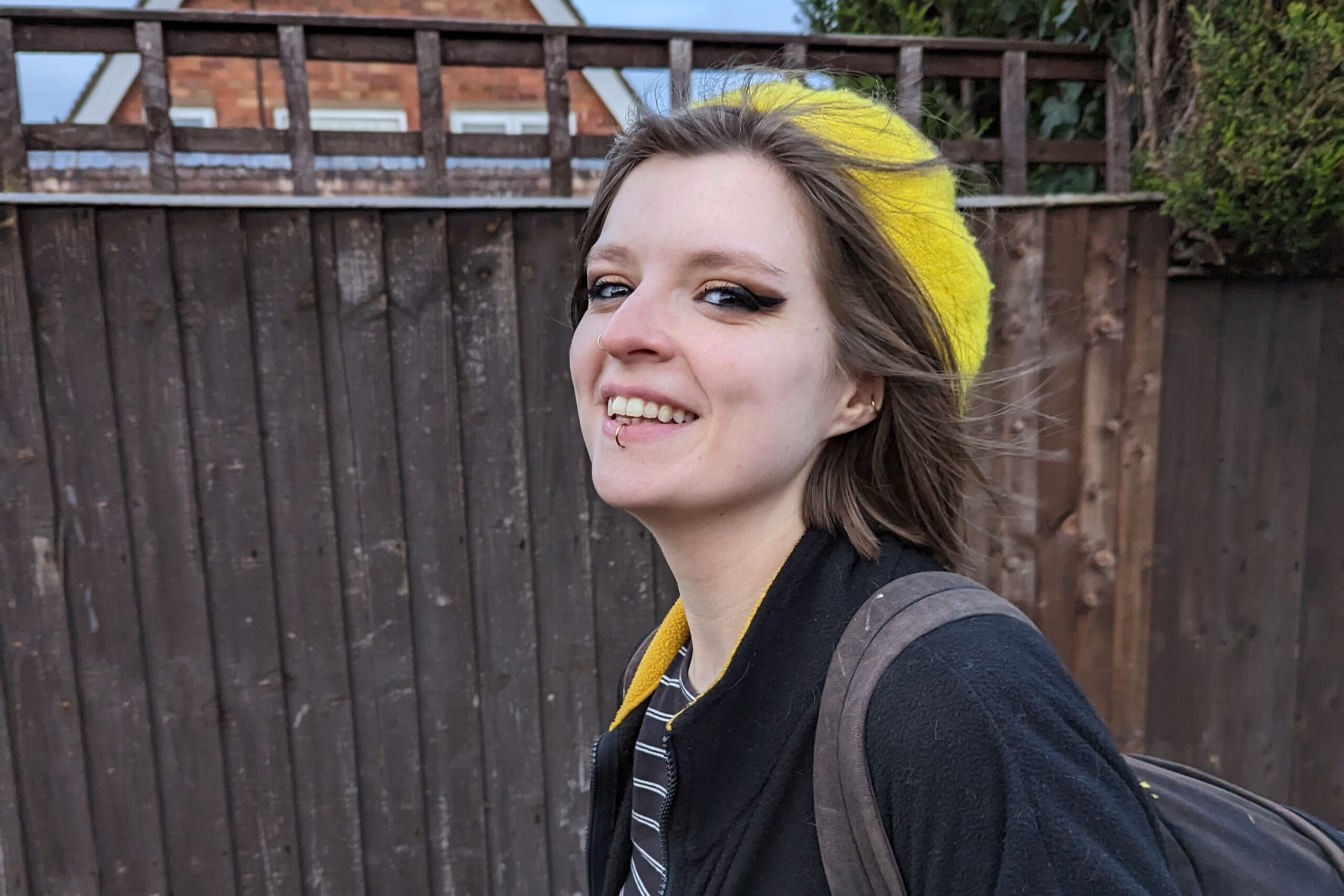 Tor smiling at the camera